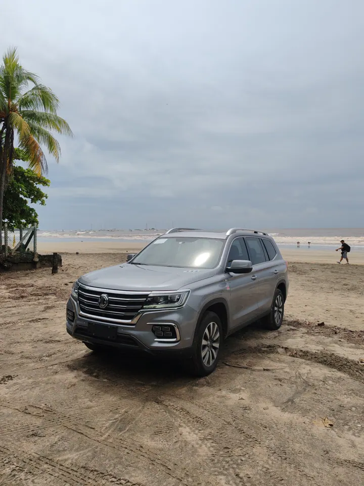 Private SUV on a Pacific coast beach